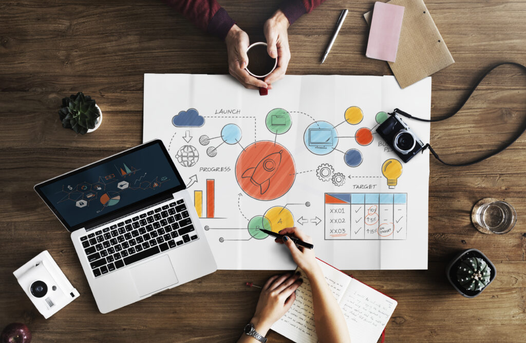 Creative workspace setup for a collaborative startup or project planning session.